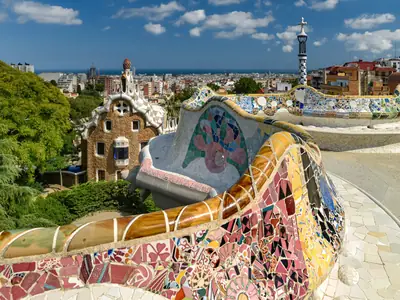 Gaudí's mosaic serpentine bench in Park Güell overlooking Barcelona