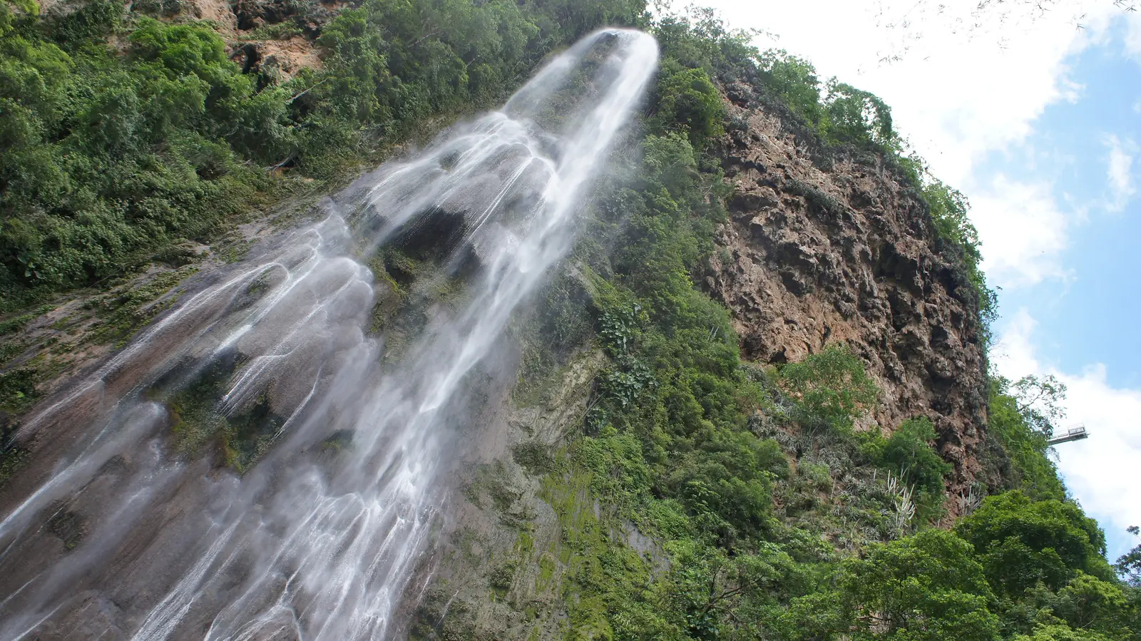 The Boca da Onça waterfall dropping into a forested gorge near Bodoquena