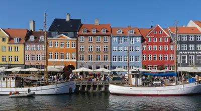 Colourful townhouses and boats along Nyhavn, Copenhagen