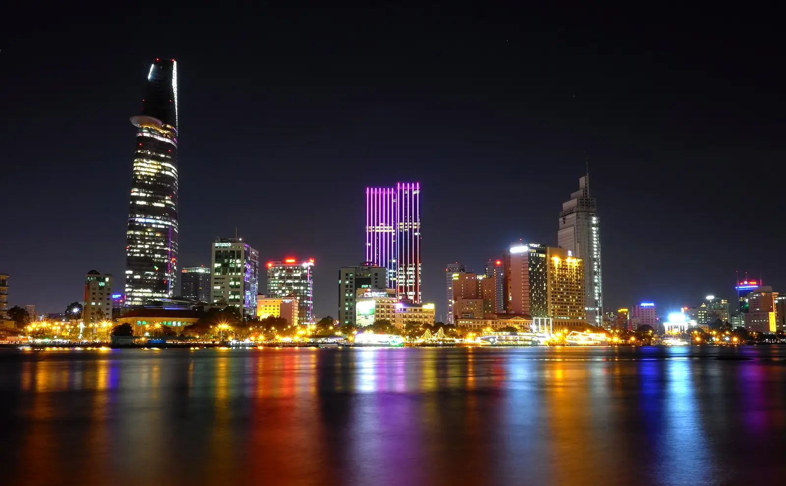 The Ho Chi Minh City skyline over the Saigon River at night