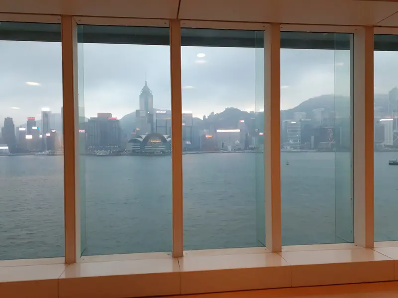 A gallery window looking across Victoria Harbour