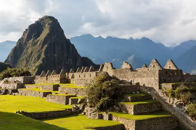 The ruins of Machu Picchu on their mountain ridge