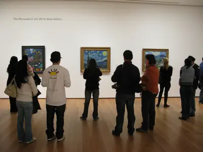 Visitors in front of Van Gogh's The Starry Night at MoMA