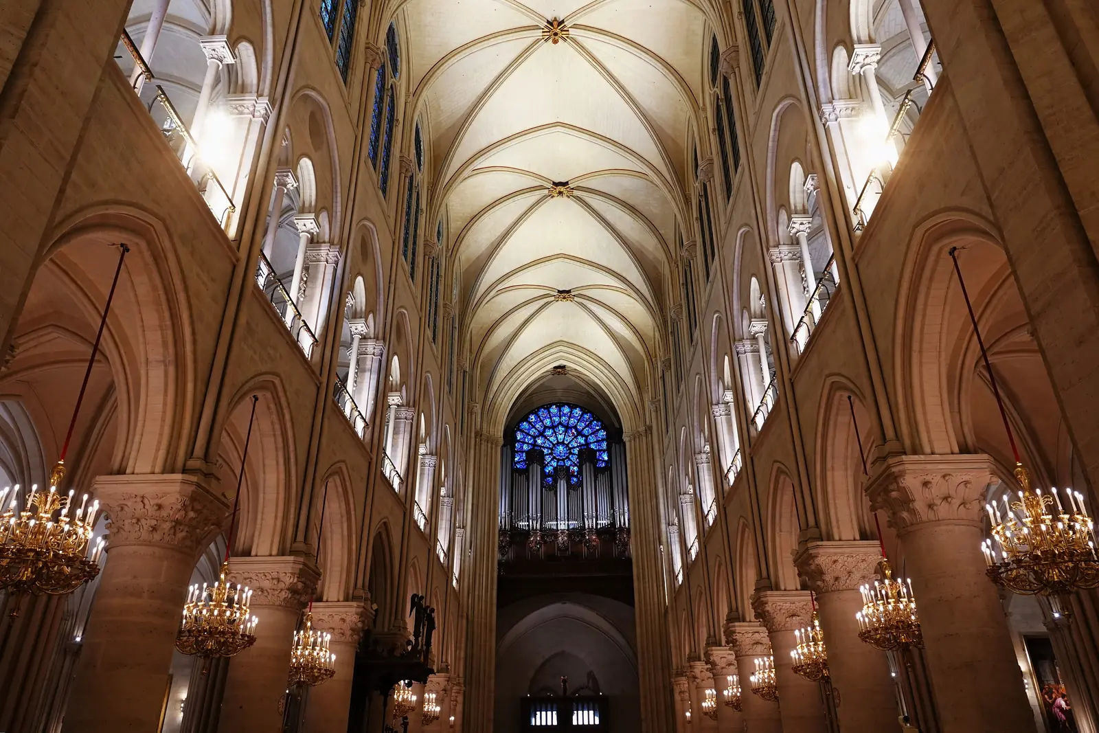 The restored nave of Notre-Dame de Paris looking towards the west portal, 2024