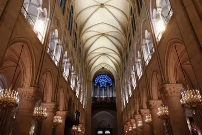 The restored nave of Notre-Dame de Paris looking towards the west portal, 2024