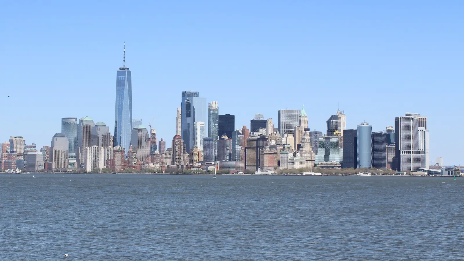 Lower Manhattan skyline seen across the harbour from Liberty Island