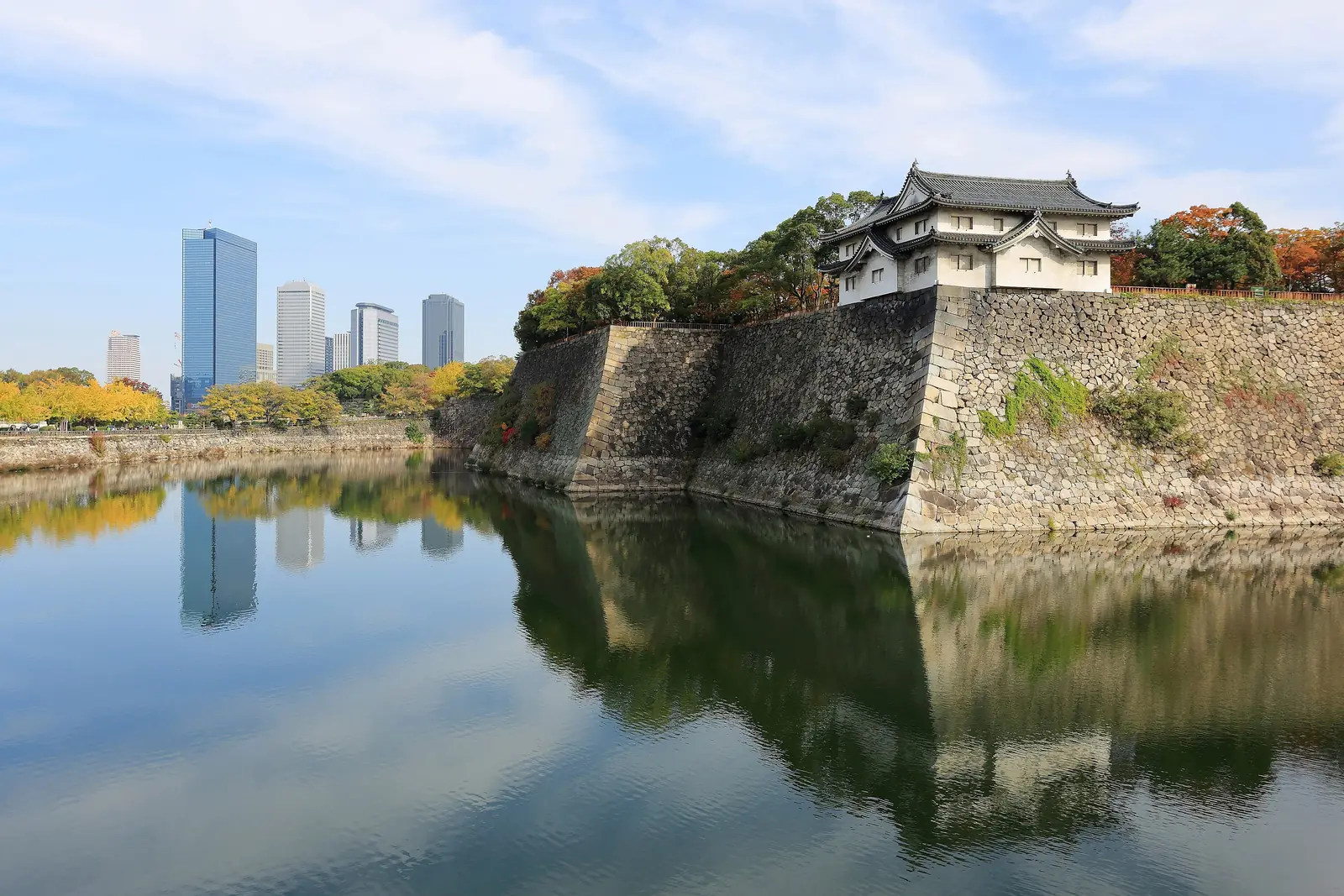 Osaka Castle above its outer moat with the Osaka Business Park towers behind