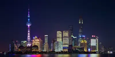 The Pudong skyline across the Huangpu River from the Bund, Shanghai, at night