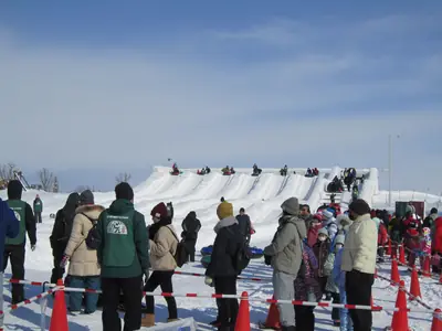 Visitors among the snow sculptures at the Sapporo Snow Festival