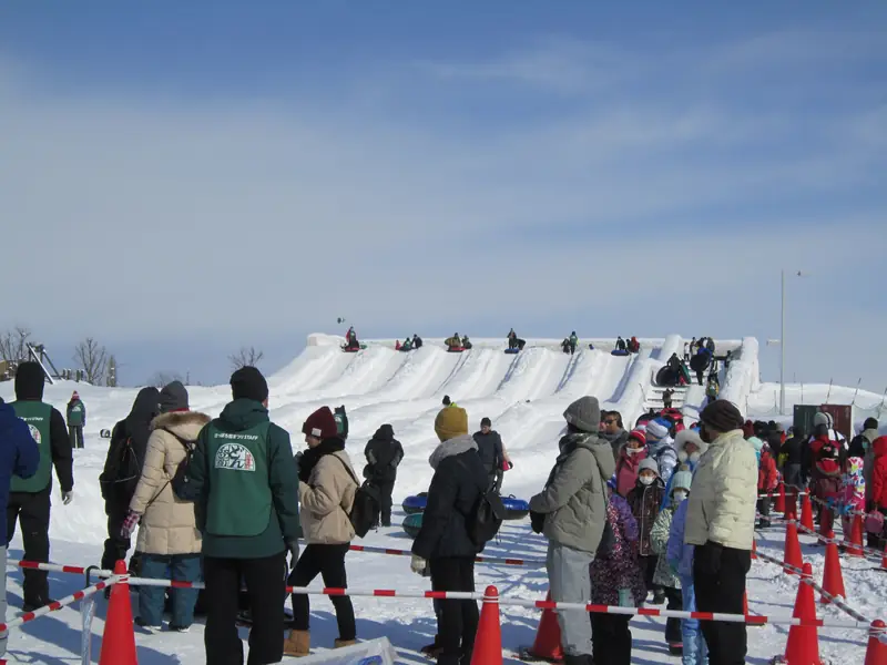 Visitors among the snow sculptures at the Sapporo Snow Festival