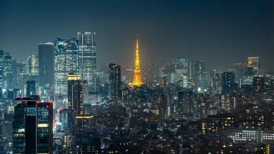 Tokyo skyline at night with the lit Tokyo Tower
